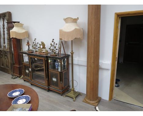 A Victorian brass telescopic standard lamp with tasselled shade 