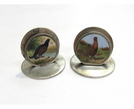 A pair of Samson Mordan and Co Ltd silver place markers with hand painted wild bird panels, Chester 1904