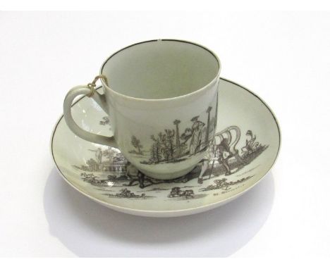An 18th Century Worcester porcelain cup and saucer, printed in black with the "Tea Party" pattern, initialled "RH" for Robert