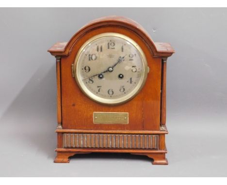 A Mansell of Lincoln mantle clock, presentation plaque to front