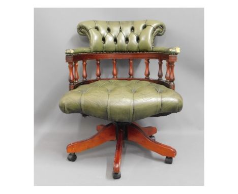 A button back leather desk chair, 31in high to back, worn leather to arms