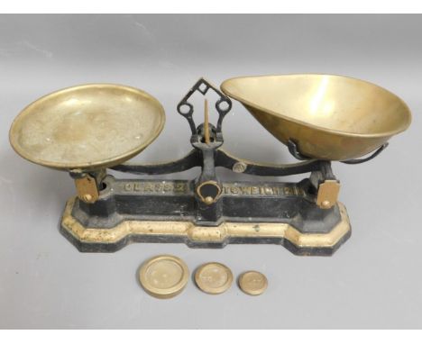 A set of brass kitchen scales