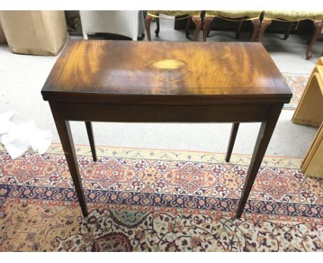 A George III style card table.