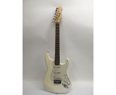 A Stagg Stratocaster style guitar in white with a white pickguard, in retail box.