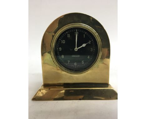 An unusual Jaeger car clock in a brass case (working order).