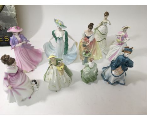 A collection of 9 Doulton and royal Worcester figures