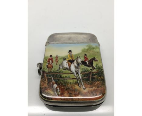 A late Victorian silver vesta case painted with a hunting scene, London hallmarks, 'J.R'.Approximately 4x5.5cm