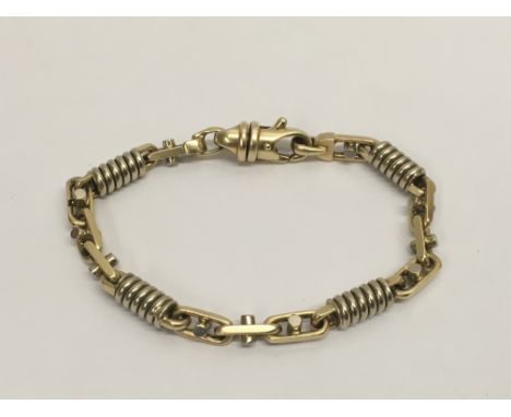 An Italian 14k gold bracelet as worn by Dave Murray of Iron Maiden, believed to have been custom made by a unique jeweller in