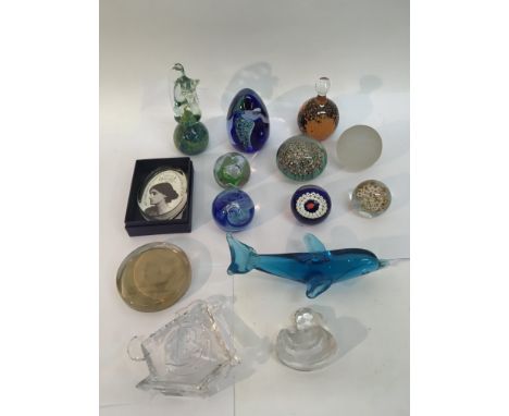 A small collection of paperweights including Caithness