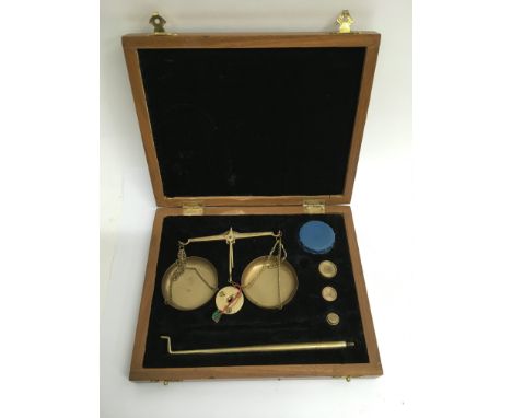 A 20th Century cased set of beam balance scales.