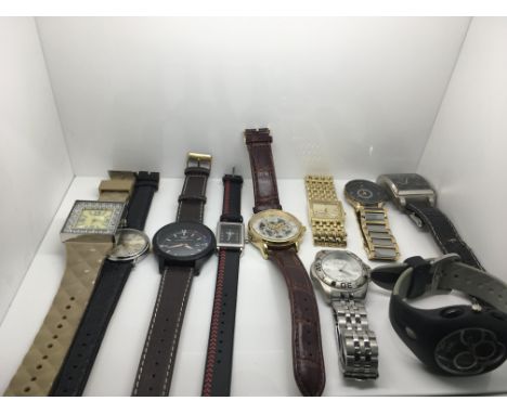 A bagged collection of watches including Rotary, Ingersoll and Fila.