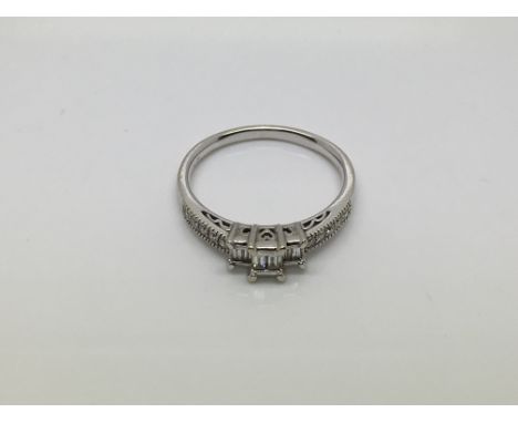 An 18ct white gold diamond ring, approx 1/2ct, size R-S and approx 4g.