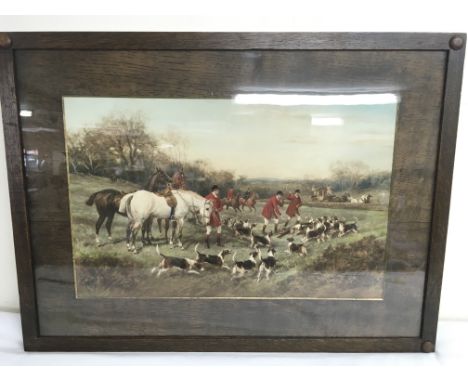 A pair of framed and glazed traditional hunting prints, one indistinctly signed to the bottom right, frames measure approxima