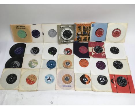 Two boxes of various 7 inch singles including Elvis Presley, The Who, Jimi Hendrix and others.