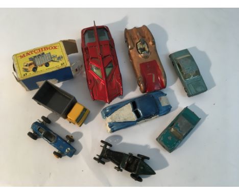 A small bag of play worn die cast cars including Dinky