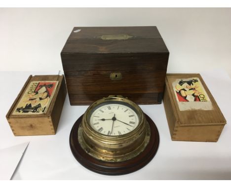A 19th Century rosewood box with brass campaign style handles and a drawer together with a fretwork cased clock and two boxed
