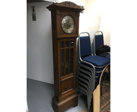 An oak longcase clock, approx 181cm.