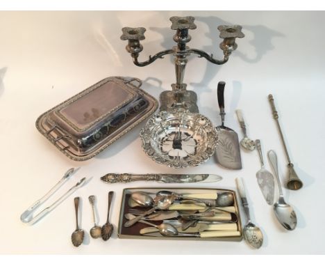 A silver plated candelabra, footed dish, tureen and cover plus silver and plated flatware
