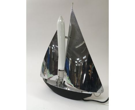 A chrome lamp in the form of a sailing boat, approx height 48cm.