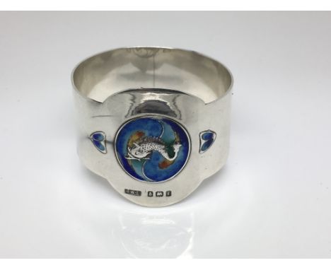 An antique silver and enamel Arts & Crafts napkin ring, Birmingham hallmarks.