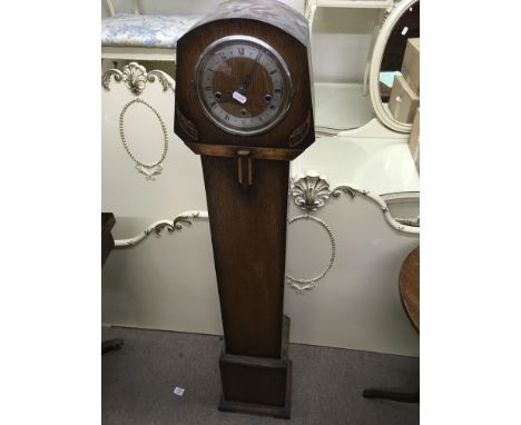 A grandmother clock with Roman numeral dial. Height approx 140cm