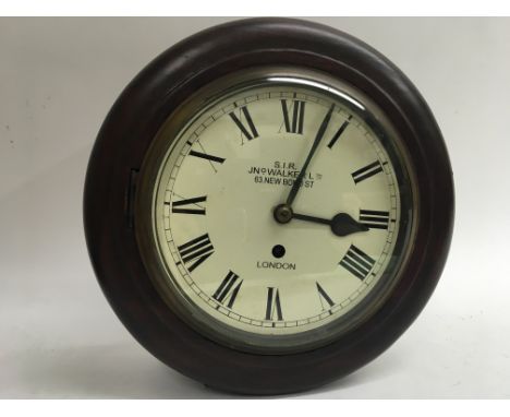 An early 20th century single fusse wall clock by JNo Walker Ltd, London.