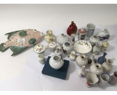 A collection of miniature vases of various design and factory with a hardwood stand and a large ceramic model of a fish