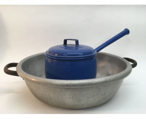 A blue enamel saucepan and an aluminium bowl (2).
