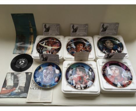 A collection of six Michael Jackson Danbury Mint plates with certificates plus a Man On The Moon 7 inch vinyl record with ins