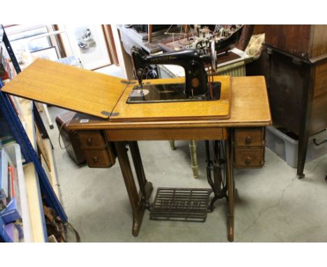 Vintage Singer 201K Manual Sewing Machine with Treadle Table, complete with instructions booklet, key for drawers and a box o