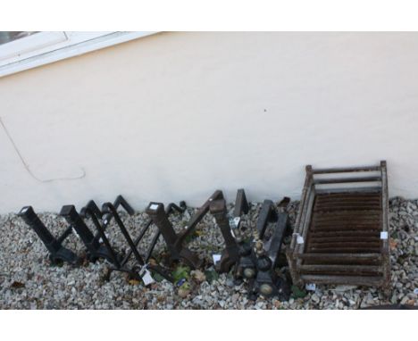 Four Pairs of Cast Iron Fire Dogs and a Fire Grate