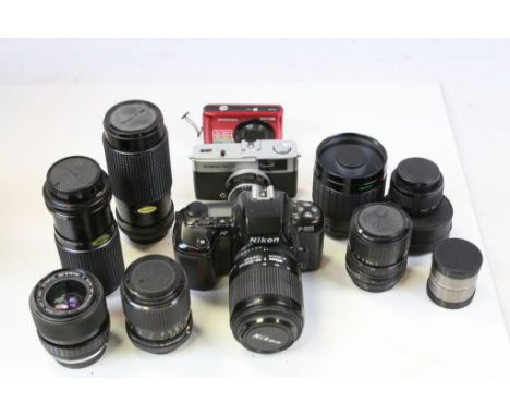 Group of camera equipment to include Nikon F601, lenses etc
