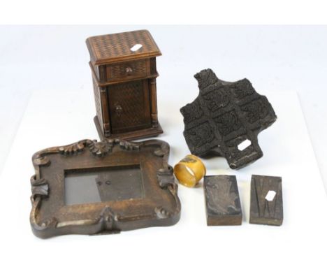 Group of six wooden item featuring miniature cabinet, Mauchline ware Isle of Wight napkin ring, stamp etc