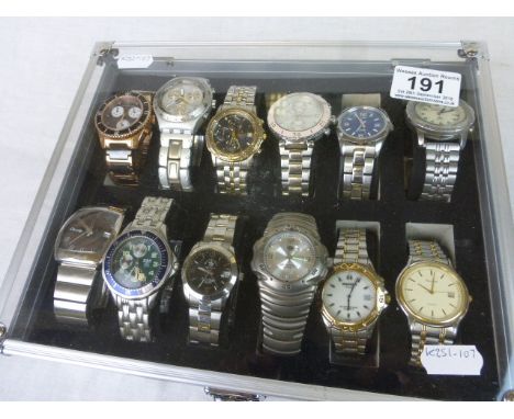 Twelve Gents Quartz Wristwatches to include Timex expedition, Fossil, Accurist Chronograph, etc plus Display case