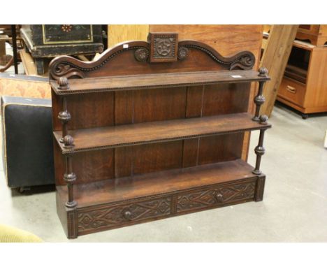 19th C carved oak shelf unit with 2 drawers