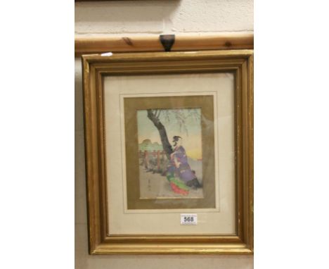 Signed Japanese woodcut portrait of an elegant lady in a country setting