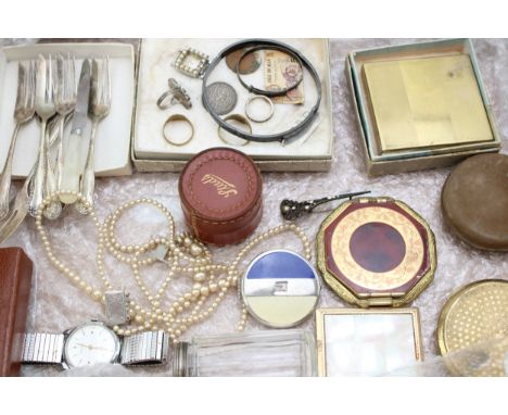 A mixed collection of costume jewelley to include silver bangle, silver christening bangle, silver ingot pendant and other si