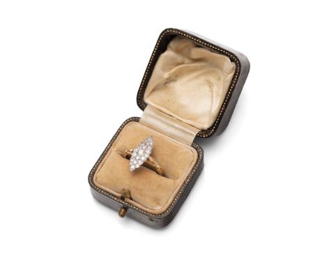 An early Art Deco diamond cluster ring, the marquise shaped setting set with twenty two old European cut diamonds, the larges