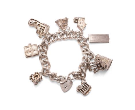 Silver chunky curb link charm bracelet with charms to include the old woman who lived in a shoe, a caravan and others, 104.7g