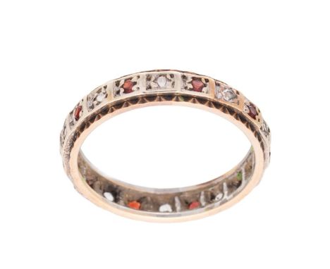 A 9ct gold, garnet and quartz eternity ring, size P, 2.7g.