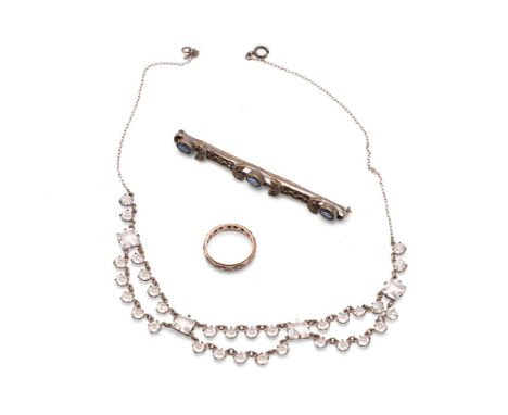 A silver, 9ct gold and spinel set eternity ring, size L, 2.1g, together with a paste festoon necklace and a marcasite and pas