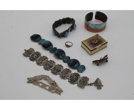 A collection of silver and white metal vintage filigree jewellery items to include bracelets, brooches and ring (Qty).