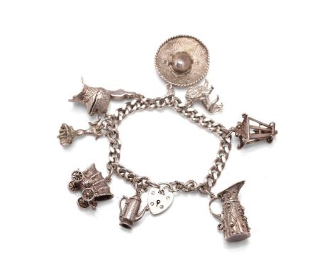 Silver charm bracelet to include a knight's helmet, a caravan and others, 71.9g.