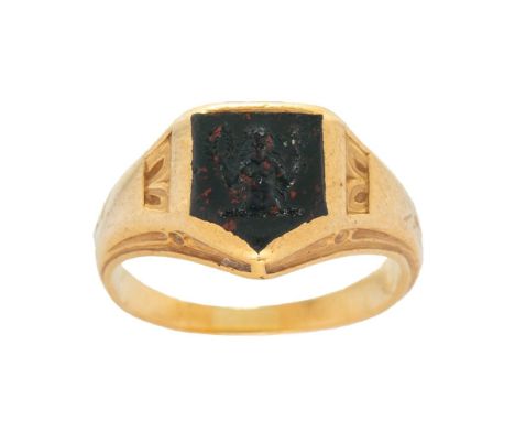 A gold signet ring, testing as 20ct, with intaglio bloodstone cartouche, of a classical figure holding a laurel and thistle, 