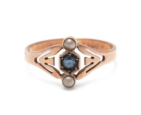 An 8ct gold, likely German, Art Deco dress ring, set with blue glass and seed pearls, the shank marked 333, total weight 1.7g