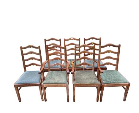 Set of seven early 20th century lined oak ladder back chairs, with two carvers