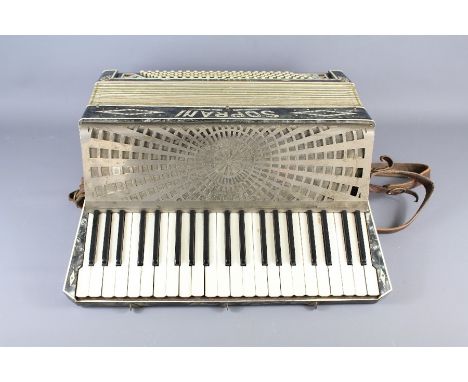 A Vintage Soprani Three Piano Accordion. With decorative bone-effect inlay.&nbsp;