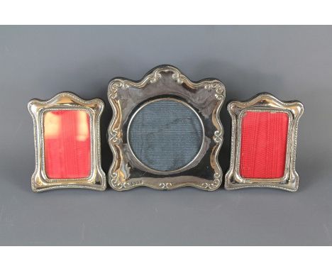 Three Silver Photo Frames. The first photo frame London hallmark, with Britannia standard, mm Paul Vernon Fitchie, grey moire