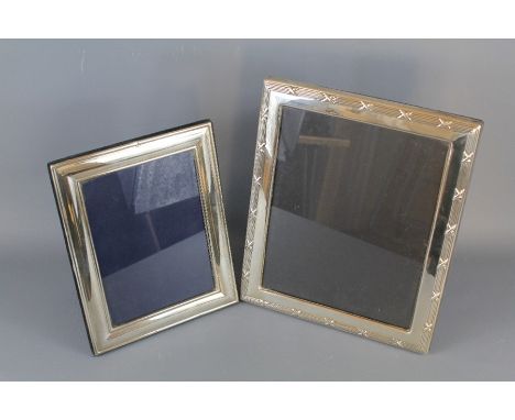 A Robert Carr Silver Photo Frame. Sheffield hallmark, dated 1996, the rear having an&nbsp;easel support, approx 31 x 26 cms t