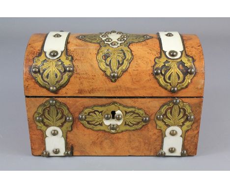 A Victorian Walnut and Brass Tea Caddy. The tea caddy having brass stud decoration. There are two covered tea compartments in